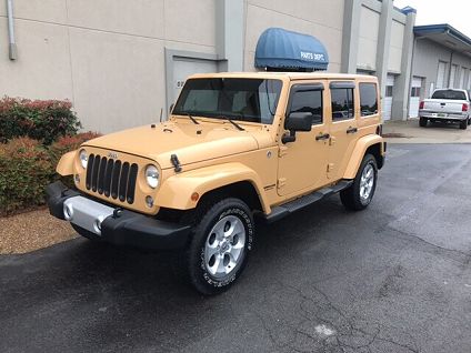 beige jeep wrangler
